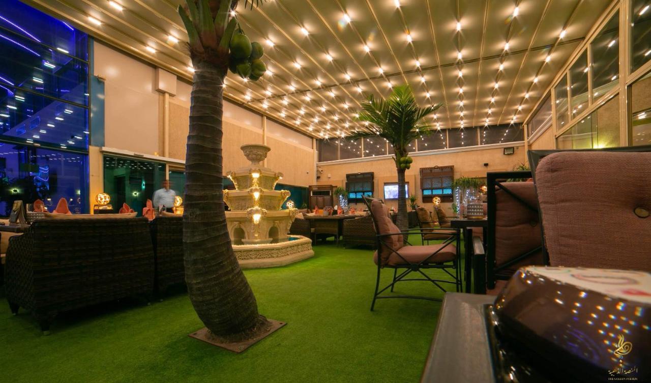 Casablanca Grand Hotel Jiddah Esterno foto The interior of the restaurant